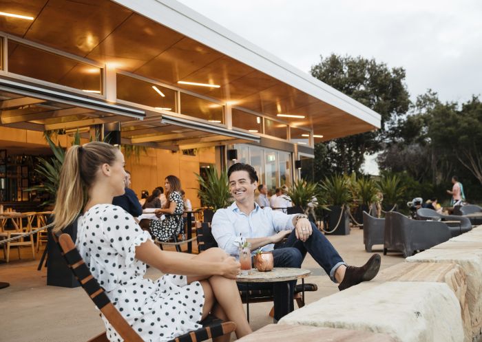 The BOX on the Water, Ettalong Beach Couple enjoying evening drinks at The BOX on the Water restaurant and bar, Ettalong Beach