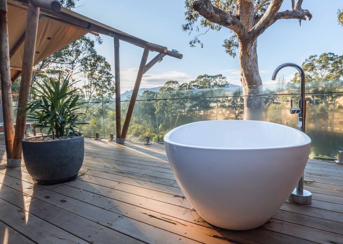 Bath on verandah at Currajong Retreat, Burragate