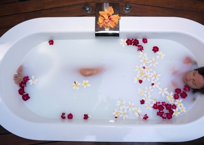 Arajilla Retreat, Lord Howe Island Woman enjoying bath at Arajilla Retreat, Lord Howe Island