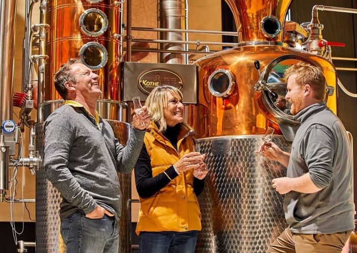 People enjoying schnapps tasting at Wildbrumby Distillery, Jindabyne