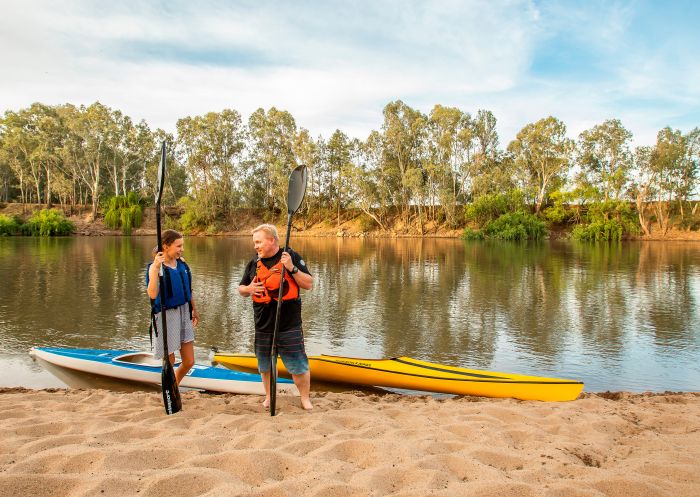 Father and daughter enjoying a day of kayaking at Riverside, Wagga Wagga Beach
