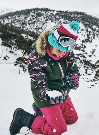 Children enjoying a fun day in the snow at Thredbo, Snowy Mountains