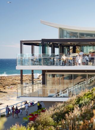 People enjoying food and drink with ocean views, Merewether Surfhouse, Newcastle